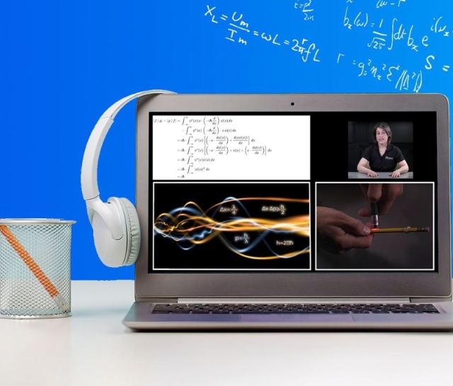 Laptop showing teacher and online course material