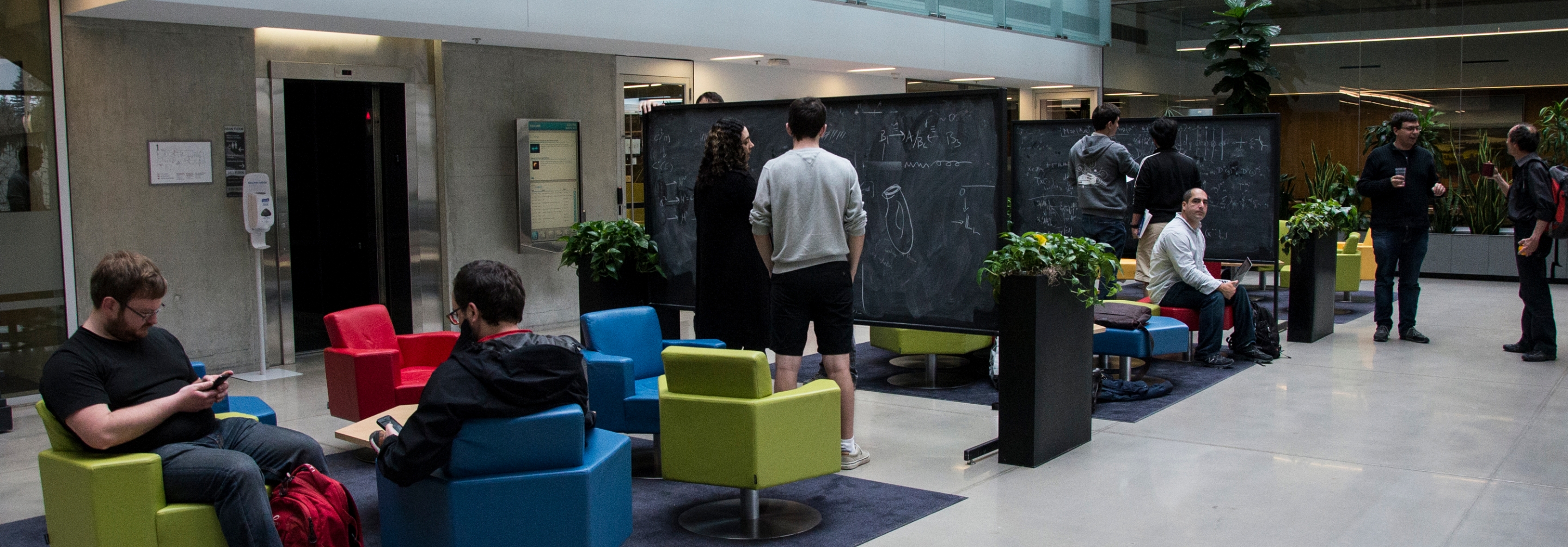 Group of people working together in the atrium